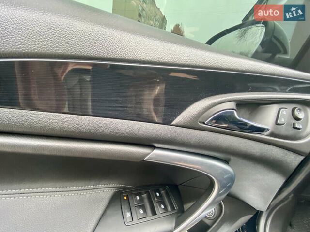 Чорний Опель Інсігнія, об'ємом двигуна 1.6 л та пробігом 170 тис. км за 12500 $, фото 14 на Automoto.ua