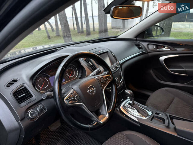 Чорний Опель Інсігнія, об'ємом двигуна 1.6 л та пробігом 276 тис. км за 8700 $, фото 5 на Automoto.ua