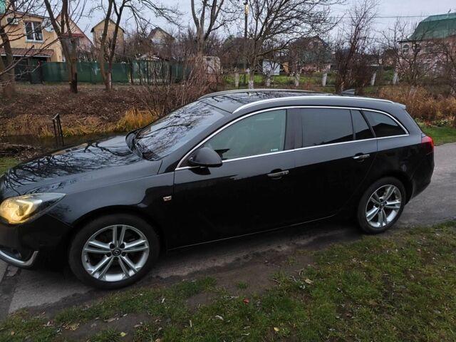 Чорний Опель Інсігнія, об'ємом двигуна 2 л та пробігом 255 тис. км за 10999 $, фото 3 на Automoto.ua