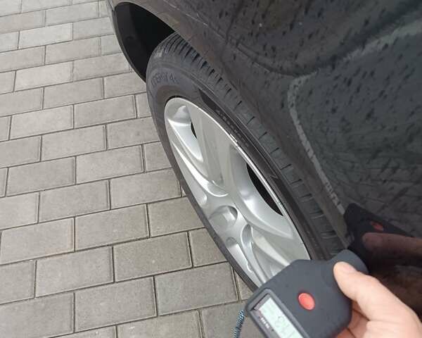 Черный Опель Инсигния, объемом двигателя 1.6 л и пробегом 260 тыс. км за 8750 $, фото 17 на Automoto.ua