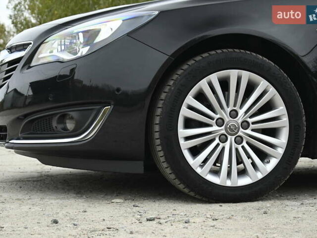 Черный Опель Инсигния, объемом двигателя 1.96 л и пробегом 248 тыс. км за 13500 $, фото 5 на Automoto.ua