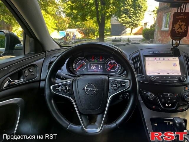 Черный Опель Инсигния, объемом двигателя 2 л и пробегом 218 тыс. км за 10500 $, фото 5 на Automoto.ua