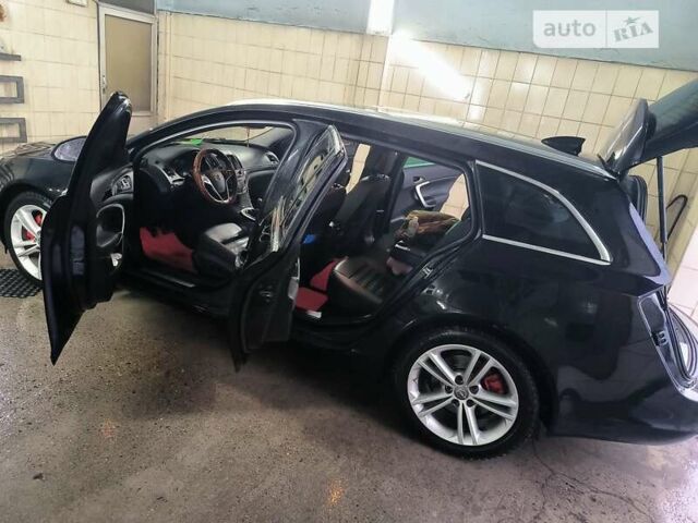 Чорний Опель Інсігнія, об'ємом двигуна 1.96 л та пробігом 290 тис. км за 10900 $, фото 8 на Automoto.ua