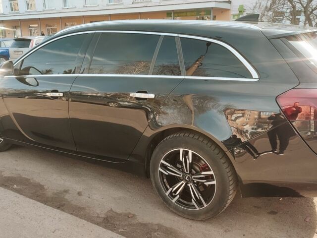 Черный Опель Инсигния, объемом двигателя 1.6 л и пробегом 189 тыс. км за 9800 $, фото 2 на Automoto.ua