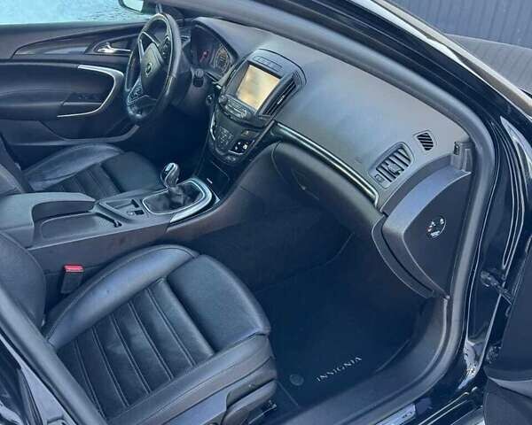 Чорний Опель Інсігнія, об'ємом двигуна 1.96 л та пробігом 165 тис. км за 12850 $, фото 10 на Automoto.ua