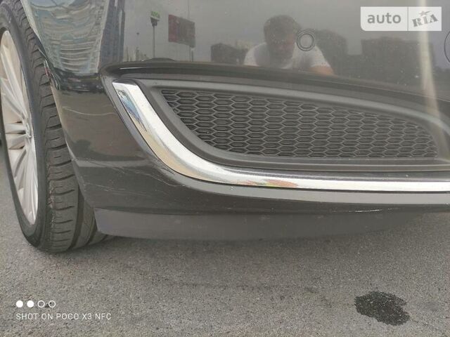 Черный Опель Инсигния, объемом двигателя 2 л и пробегом 237 тыс. км за 12500 $, фото 7 на Automoto.ua