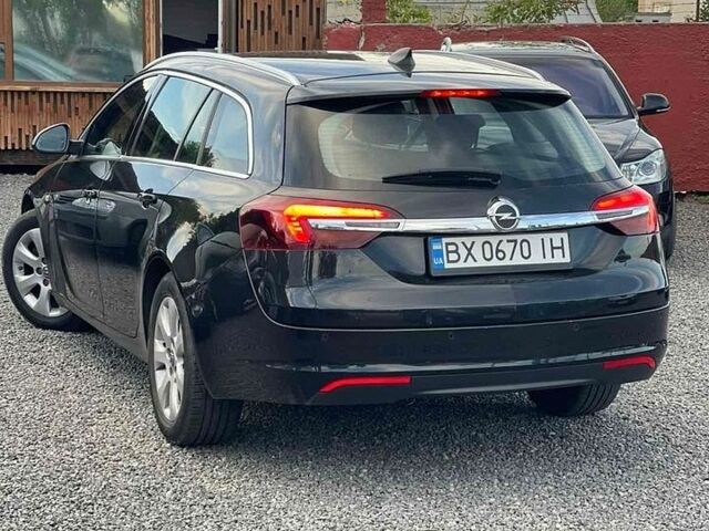 Чорний Опель Інсігнія, об'ємом двигуна 1.6 л та пробігом 195 тис. км за 11900 $, фото 1 на Automoto.ua