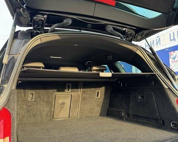 Черный Опель Инсигния, объемом двигателя 2 л и пробегом 160 тыс. км за 11900 $, фото 6 на Automoto.ua