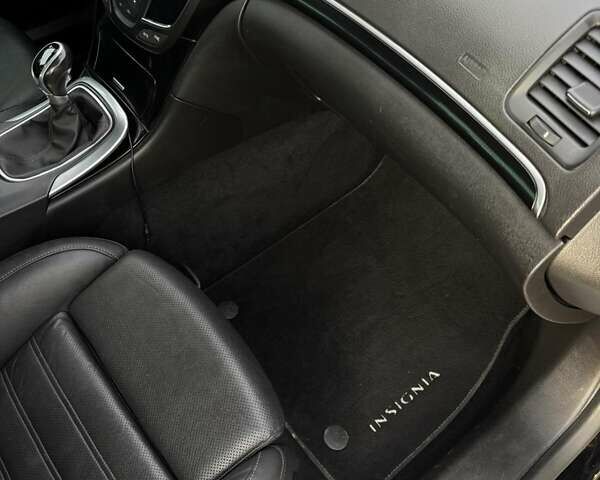 Черный Опель Инсигния, объемом двигателя 2 л и пробегом 160 тыс. км за 11900 $, фото 16 на Automoto.ua