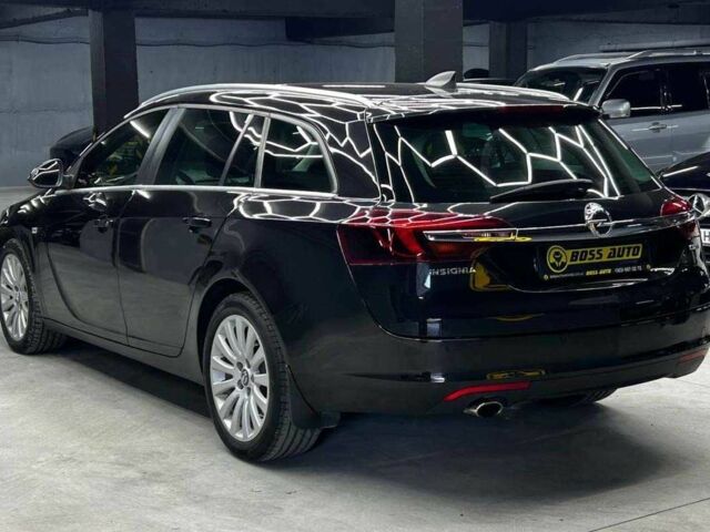 Черный Опель Инсигния, объемом двигателя 2 л и пробегом 324 тыс. км за 10800 $, фото 3 на Automoto.ua