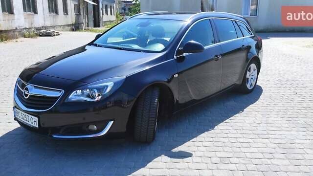 Чорний Опель Інсігнія, об'ємом двигуна 2 л та пробігом 251 тис. км за 11500 $, фото 3 на Automoto.ua