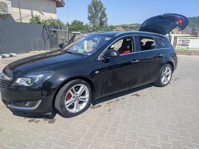 Черный Опель Инсигния, объемом двигателя 2 л и пробегом 290 тыс. км за 10905 $, фото 1 на Automoto.ua