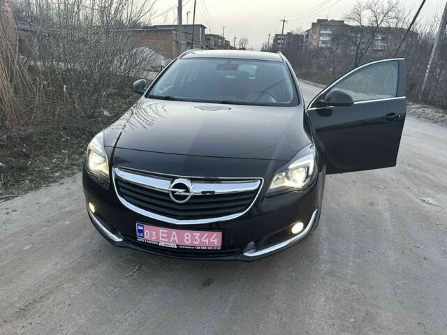 Чорний Опель Інсігнія, об'ємом двигуна 2 л та пробігом 140 тис. км за 11500 $, фото 3 на Automoto.ua