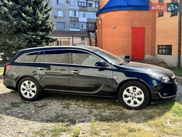 Черный Опель Инсигния, объемом двигателя 1.6 л и пробегом 154 тыс. км за 12300 $, фото 5 на Automoto.ua