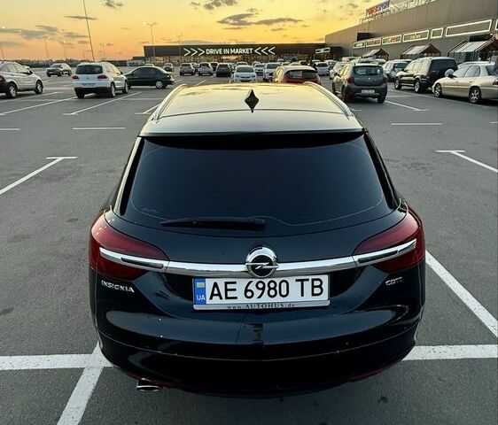 Черный Опель Инсигния, объемом двигателя 2 л и пробегом 170 тыс. км за 9500 $, фото 6 на Automoto.ua