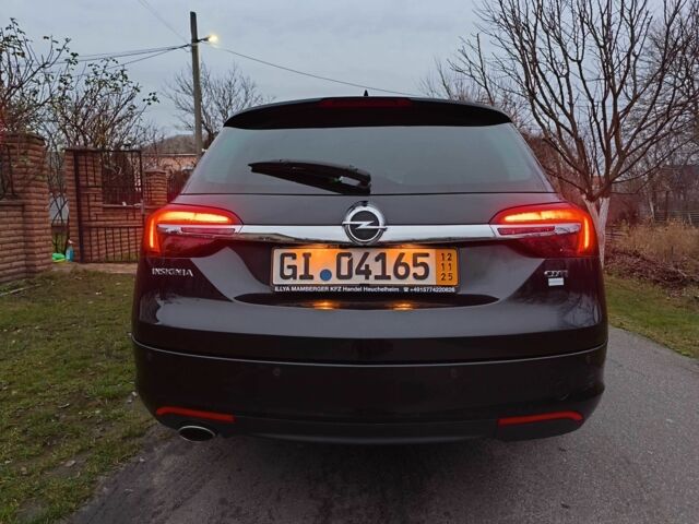 Чорний Опель Інсігнія, об'ємом двигуна 2 л та пробігом 255 тис. км за 10999 $, фото 6 на Automoto.ua