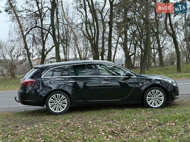 Чорний Опель Інсігнія, об'ємом двигуна 1.6 л та пробігом 276 тис. км за 8700 $, фото 11 на Automoto.ua
