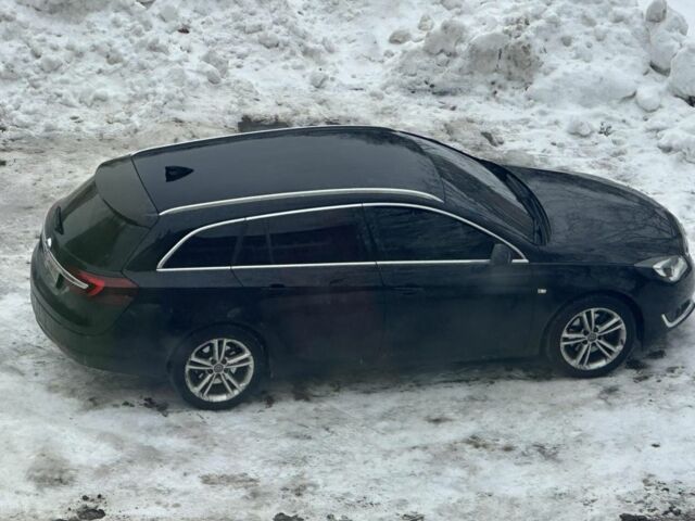 Чорний Опель Інсігнія, об'ємом двигуна 2 л та пробігом 140 тис. км за 11500 $, фото 4 на Automoto.ua