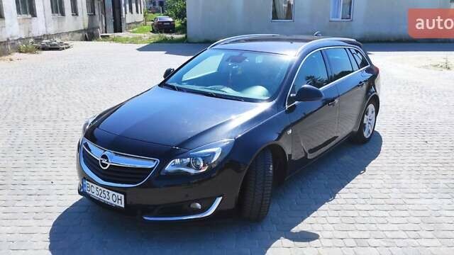 Чорний Опель Інсігнія, об'ємом двигуна 2 л та пробігом 251 тис. км за 11500 $, фото 1 на Automoto.ua