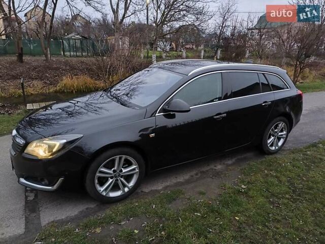 Черный Опель Инсигния, объемом двигателя 1.96 л и пробегом 255 тыс. км за 10999 $, фото 1 на Automoto.ua