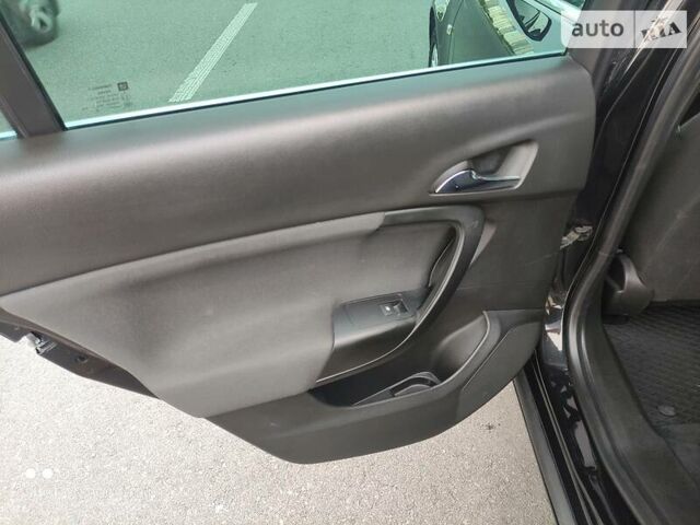 Черный Опель Инсигния, объемом двигателя 2 л и пробегом 237 тыс. км за 12500 $, фото 24 на Automoto.ua