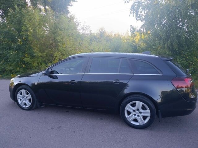 Черный Опель Инсигния, объемом двигателя 1.6 л и пробегом 316 тыс. км за 8800 $, фото 7 на Automoto.ua