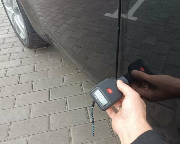 Черный Опель Инсигния, объемом двигателя 1.6 л и пробегом 260 тыс. км за 8750 $, фото 14 на Automoto.ua