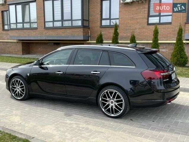 Чорний Опель Інсігнія, об'ємом двигуна 1.96 л та пробігом 238 тис. км за 11500 $, фото 4 на Automoto.ua