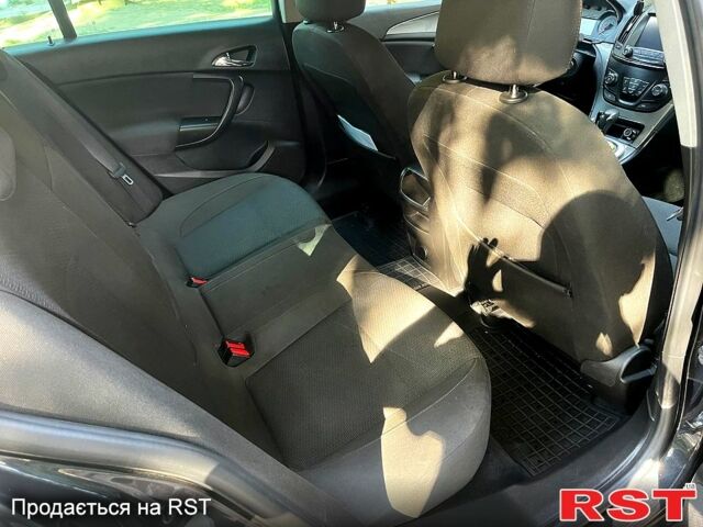 Черный Опель Инсигния, объемом двигателя 2 л и пробегом 218 тыс. км за 10500 $, фото 6 на Automoto.ua