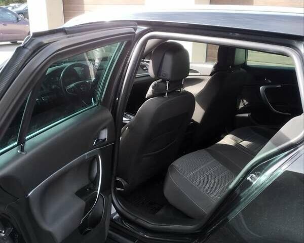 Чорний Опель Інсігнія, об'ємом двигуна 1.6 л та пробігом 225 тис. км за 12200 $, фото 7 на Automoto.ua