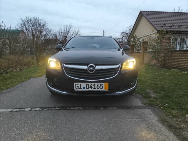 Чорний Опель Інсігнія, об'ємом двигуна 2 л та пробігом 255 тис. км за 10999 $, фото 2 на Automoto.ua