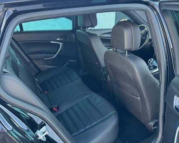 Чорний Опель Інсігнія, об'ємом двигуна 1.96 л та пробігом 165 тис. км за 12850 $, фото 11 на Automoto.ua