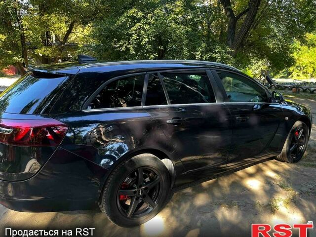 Чорний Опель Інсігнія, об'ємом двигуна 2 л та пробігом 218 тис. км за 10500 $, фото 9 на Automoto.ua