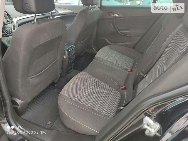 Черный Опель Инсигния, объемом двигателя 2 л и пробегом 237 тыс. км за 12500 $, фото 19 на Automoto.ua