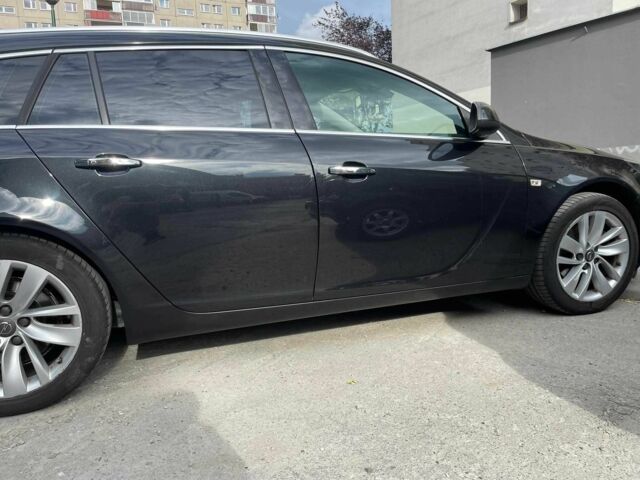 Черный Опель Инсигния, объемом двигателя 2 л и пробегом 219 тыс. км за 6386 $, фото 4 на Automoto.ua