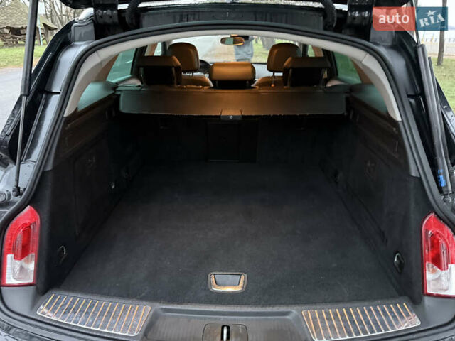 Чорний Опель Інсігнія, об'ємом двигуна 1.6 л та пробігом 276 тис. км за 8700 $, фото 19 на Automoto.ua