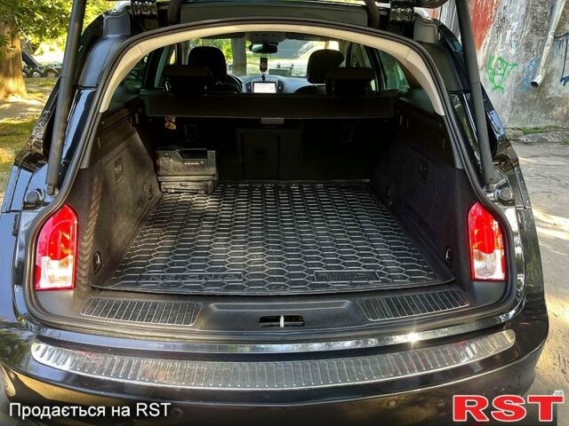 Чорний Опель Інсігнія, об'ємом двигуна 2 л та пробігом 218 тис. км за 10500 $, фото 2 на Automoto.ua