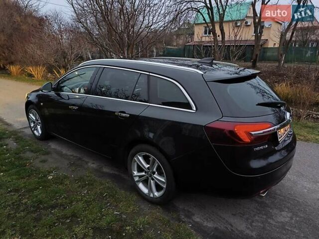 Черный Опель Инсигния, объемом двигателя 1.96 л и пробегом 255 тыс. км за 10999 $, фото 5 на Automoto.ua