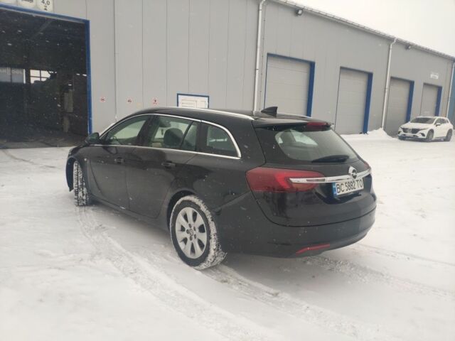 Чорний Опель Інсігнія, об'ємом двигуна 1.6 л та пробігом 208 тис. км за 11500 $, фото 6 на Automoto.ua