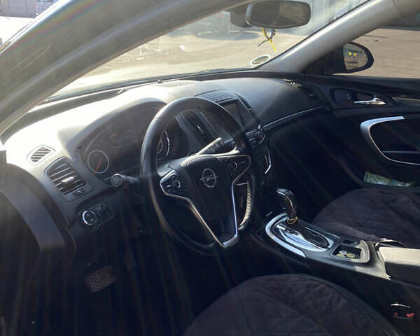 Черный Опель Инсигния, объемом двигателя 1.96 л и пробегом 220 тыс. км за 11999 $, фото 7 на Automoto.ua