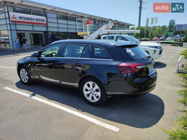 Черный Опель Инсигния, объемом двигателя 1.6 л и пробегом 221 тыс. км за 8694 $, фото 2 на Automoto.ua