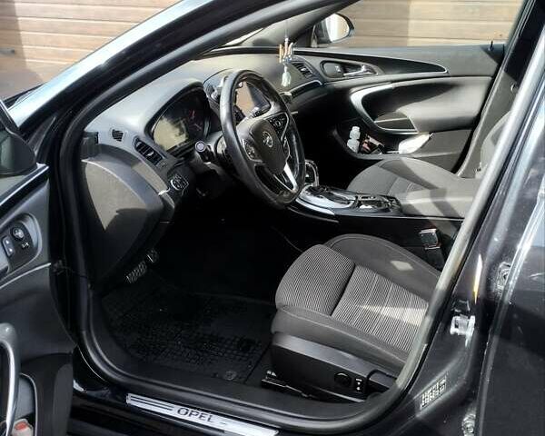 Чорний Опель Інсігнія, об'ємом двигуна 1.6 л та пробігом 225 тис. км за 12200 $, фото 5 на Automoto.ua