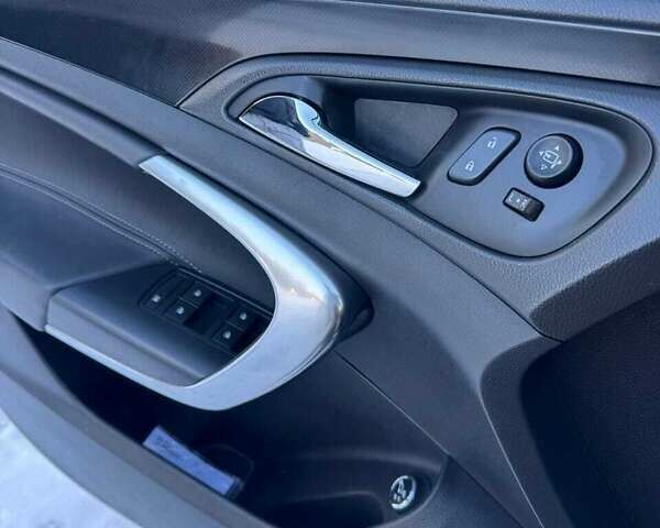 Чорний Опель Інсігнія, об'ємом двигуна 1.96 л та пробігом 165 тис. км за 12850 $, фото 9 на Automoto.ua