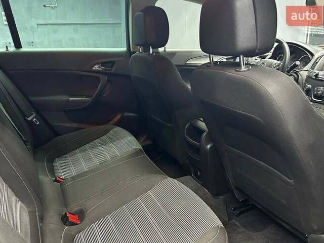 Чорний Опель Інсігнія, об'ємом двигуна 1.96 л та пробігом 324 тис. км за 10800 $, фото 13 на Automoto.ua