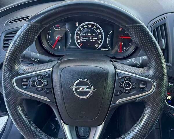 Чорний Опель Інсігнія, об'ємом двигуна 1.96 л та пробігом 165 тис. км за 12850 $, фото 2 на Automoto.ua