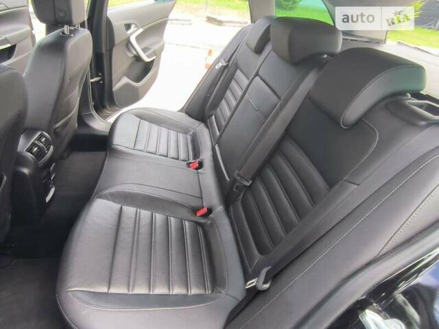 Чорний Опель Інсігнія, об'ємом двигуна 1.96 л та пробігом 290 тис. км за 10900 $, фото 14 на Automoto.ua