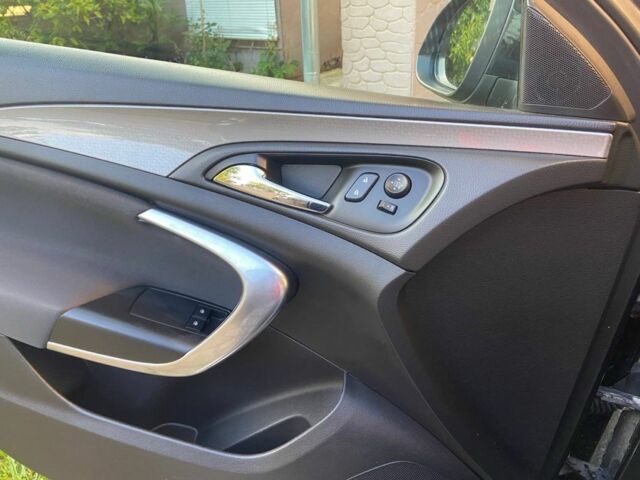 Чорний Опель Інсігнія, об'ємом двигуна 1.6 л та пробігом 168 тис. км за 10500 $, фото 14 на Automoto.ua