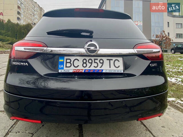Чорний Опель Інсігнія, об'ємом двигуна 1.6 л та пробігом 170 тис. км за 12500 $, фото 16 на Automoto.ua