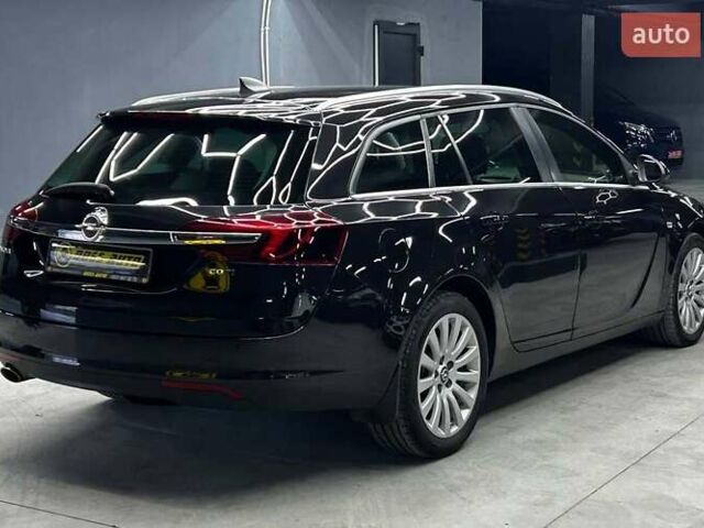 Чорний Опель Інсігнія, об'ємом двигуна 1.96 л та пробігом 324 тис. км за 10800 $, фото 5 на Automoto.ua