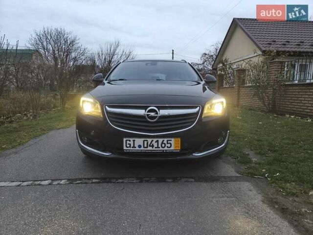 Черный Опель Инсигния, объемом двигателя 1.96 л и пробегом 255 тыс. км за 10999 $, фото 2 на Automoto.ua